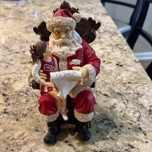 Santa Claus and Child Holiday Figurine